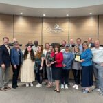 Standing left to right: Denison leaders recognized the local participants in the award-winning Ecommerce Accelerator Incentive program Monday night at the City Council meeting. Present to represent the program were: William Myers, DDA; Elsie Russell, 2 Chicks Home and Market; Jenna Zapata, Zig Zag Galleries; Neal Spencer, Spiffy Spa; Natalie Popplewell, 410 Collective + Coffee; Cathy Cobb, Totally Addicted; Nitia Musico, Monsters on Main; Denison Mayor Janet Gott; Derrick Roberts, Pop Around the Corner; Kimberlea Donohoe-Miller, The Hangin T; Wendy Acosta, The Desk and Easel; Tony Kaai, DDA; Donna Dow, Denison Main Street; and Michael McKinley, Avert 360. Seated left to right, Council members: Brian Hander, Dr. Michael Courtright, Robert Thorne, J.C. Doty, Robert Crawley and Kristofer Spiegel.